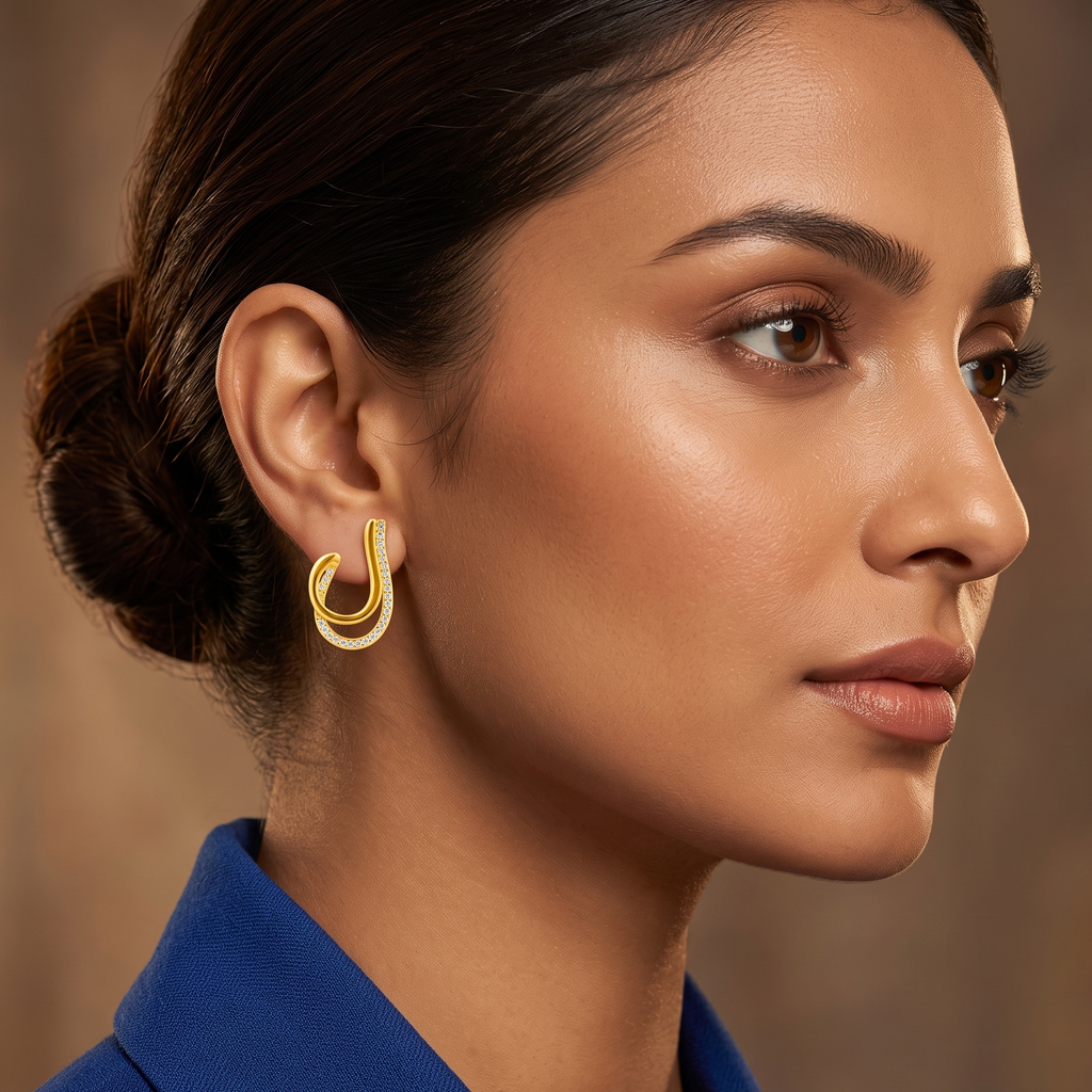 Woman wearing crystal open hoop earrings