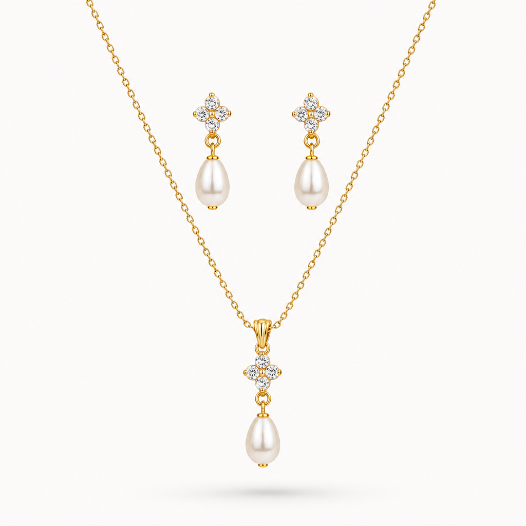 Pearl Drop Pendant & Earrings earrings set with pearls and diamonds on a white background