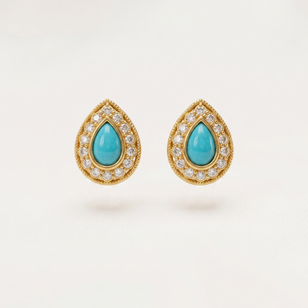 Pair of Turquoise-Blue Teardrop Studs on a white background